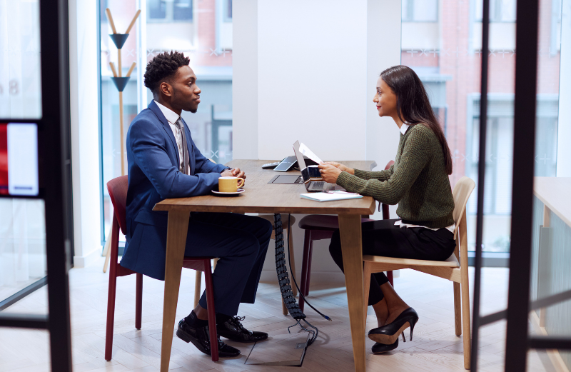 A man is at a job interview with a company recruiter. The IT sector has long lacked workforce diversity.